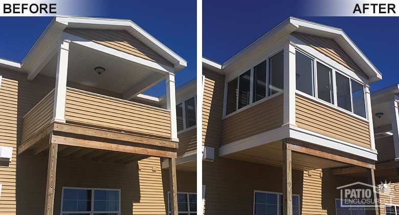 White elite three season room enclosing an existing second-story covered porch in an Amedore Homes development.