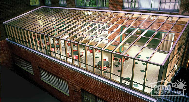 Solarium in bronze with single-slope roof at Manhattan College in the Bronx, NY.