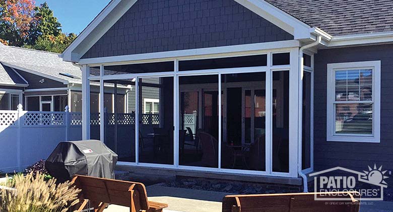 White screen room with transom enclosing existing covered patio.