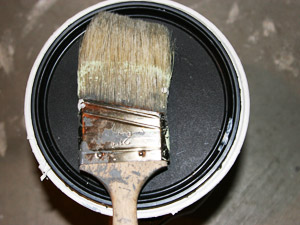 Paint can and brush