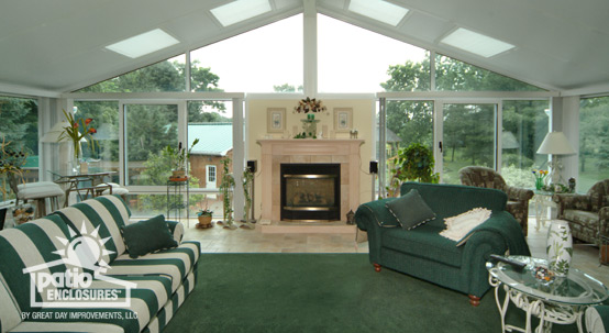 A magnificent, classic fireplace surrounded by glass