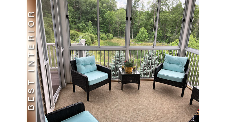 Best Interior: Screen room with picket railing, wicker furniture with light blue cushions, second-floor room.