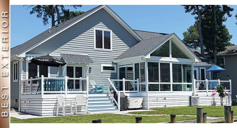Best Exterior: Gray house with gable roof three-season room on the back.
