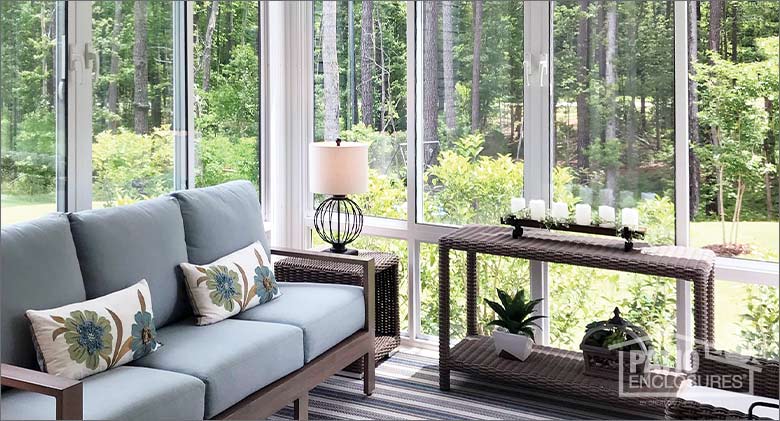 Modern light blue Sunroom sofa with a side table