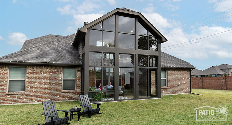 Tall wall patio enclosure on modern farmhouse