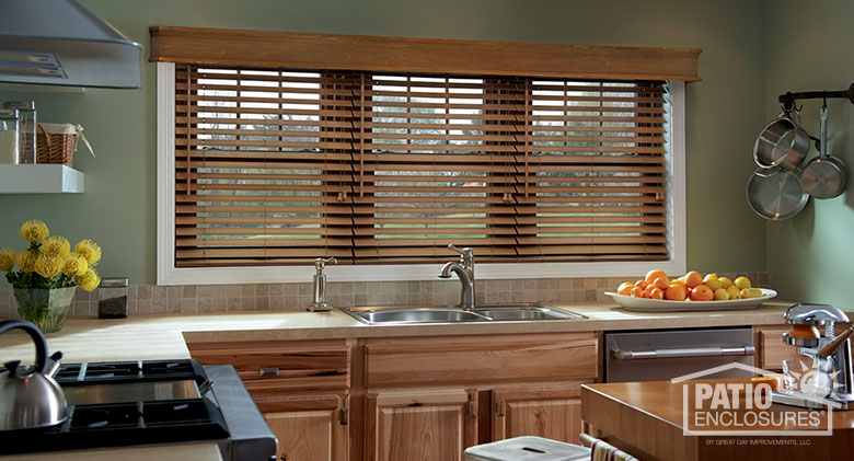 Two-inch premium faux wood blinds in Peru with noble cornice.
