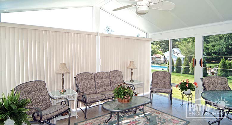 White vertical blinds change the look of the room when closed.