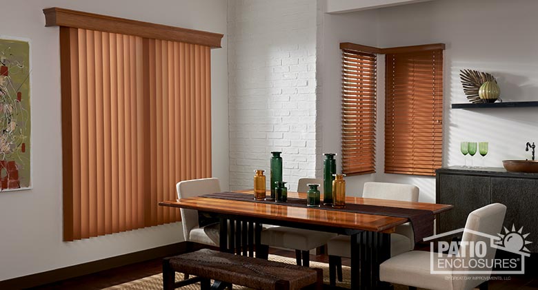 One Touch blinds with regal cornice in cognac (foreground) and faux wood blinds with wood valance.
