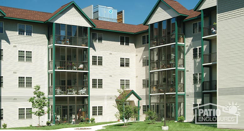 Screen rooms in bronze with picket railing systems at Avila Retirement Living in Albany, NY.