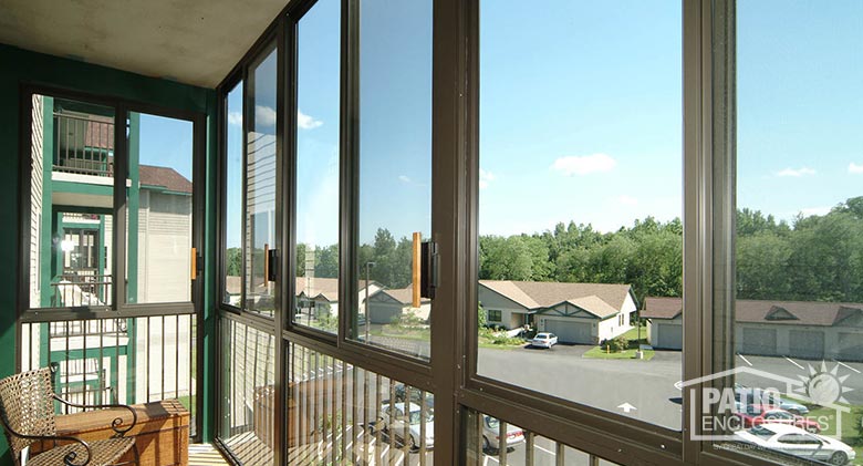 Interior of screen room in bronze with picket railing system at Avila Retirement Living in Albany, NY.