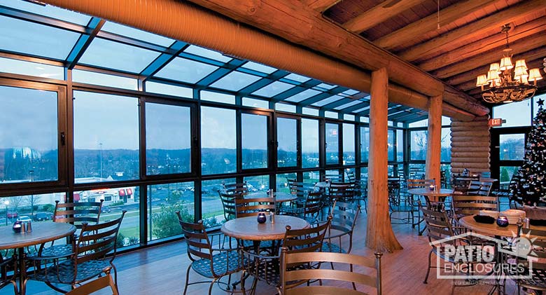 Interior of bronze solarium with single-slope roof at Blue Canyon restaurant in Cleveland, OH.