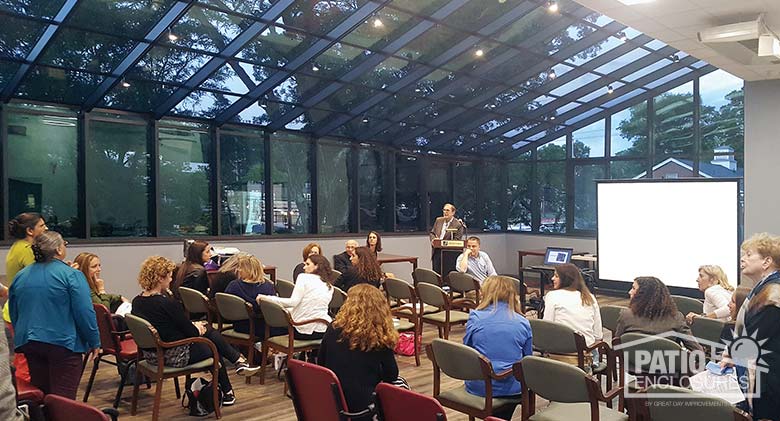 Solarium in bronze with single-slope roof used as a meeting room at the Jewish Community Center in East Orange, NJ.