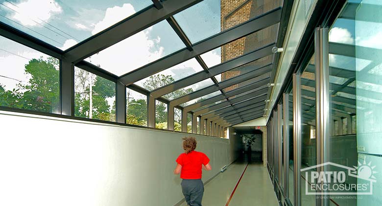 Solarium in bronze with single-slope roof at the Club LA Maison in Wayne, PA.