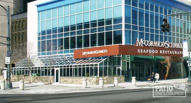 Solarium in white with single-slope roof at McCormick & Schmick Seafood Restaurant.