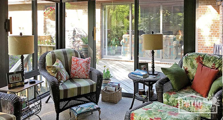 Interior view of three season room with insulated glass enclosing an existing screen room.