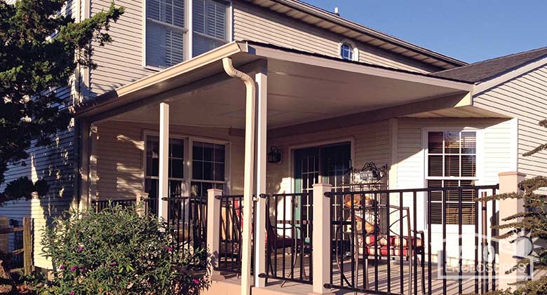 Sandstone deck cover integrated into existing railing