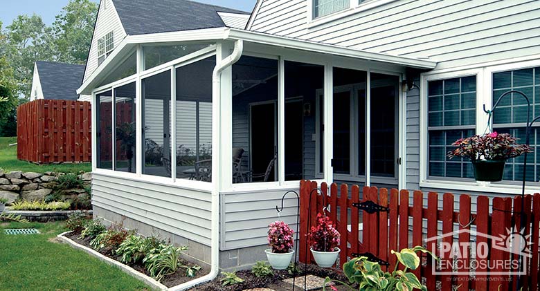 White screen room with solid knee walls and gable roof.