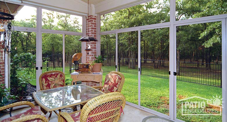 White screen room with transoms enclosing existing covered patio.