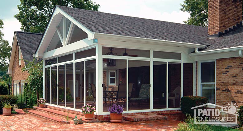 White screen room with transoms enclosing existing covered patio.