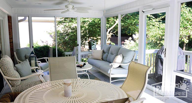 White screen room enclosing existing covered porch.