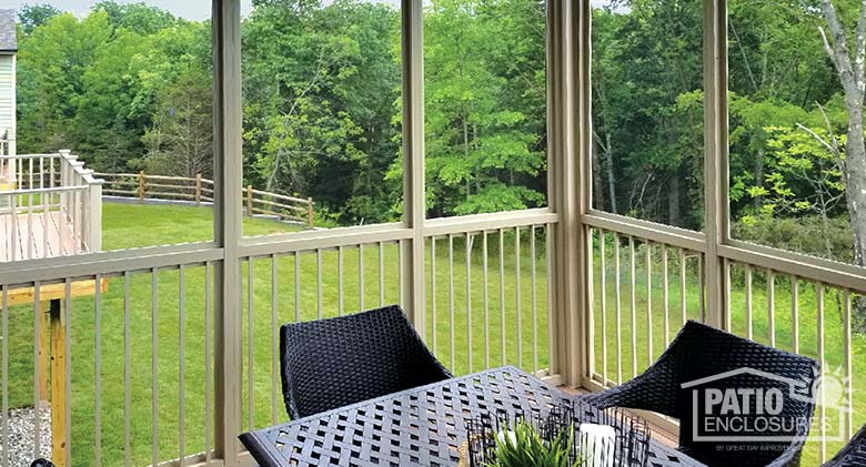 Sandstone screen room with picket railing system for safety.