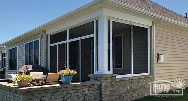 White screen room with transom enclosing existing covered patio.