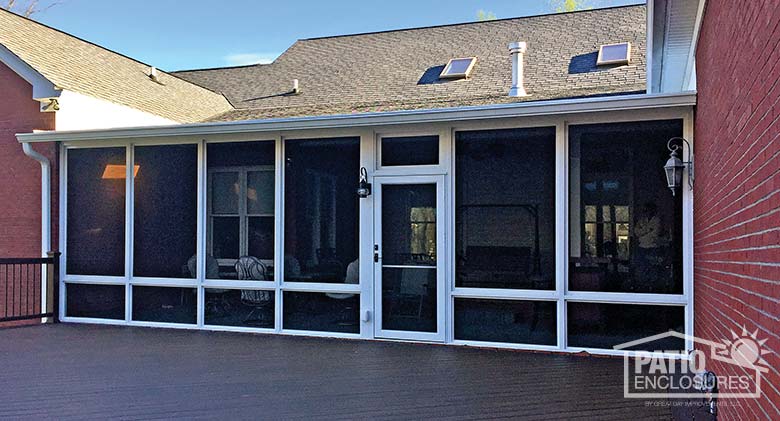 White screen room with knee wall enclosing existing covered porch.