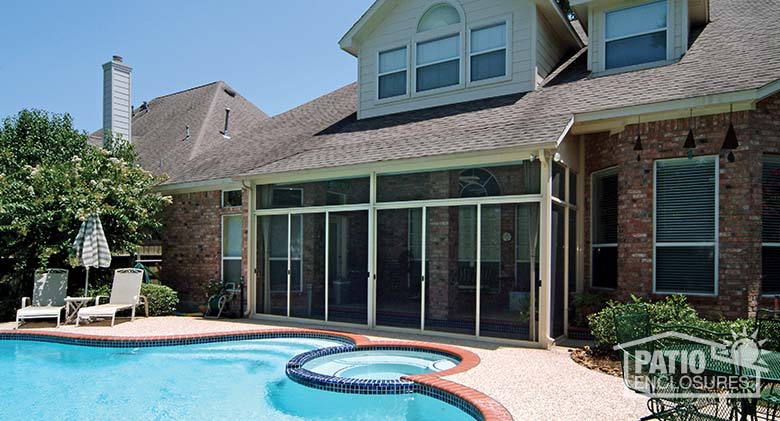 Sandstone screen room enclosing existing covered patio.