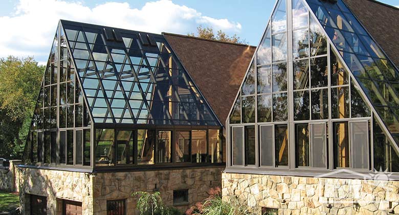 Bronze solariums with aluminum frames and gable roofs.