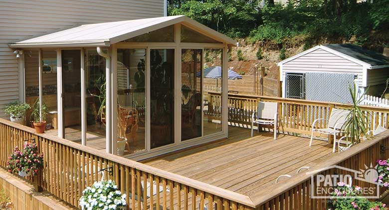 EasyRoom sunroom kit with sandstone aluminum frame and gable roof.