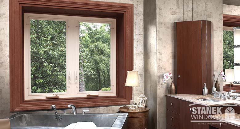 Two-lite bump-out bay window adds character to a bathroom.