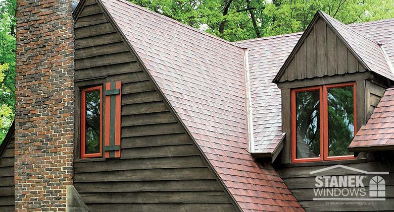 One- and two-lite casement windows in redwood exterior finish.