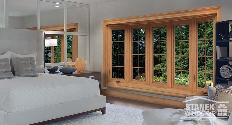 Five-lite bow window with interior woodgrain finish and interior colonial grids.