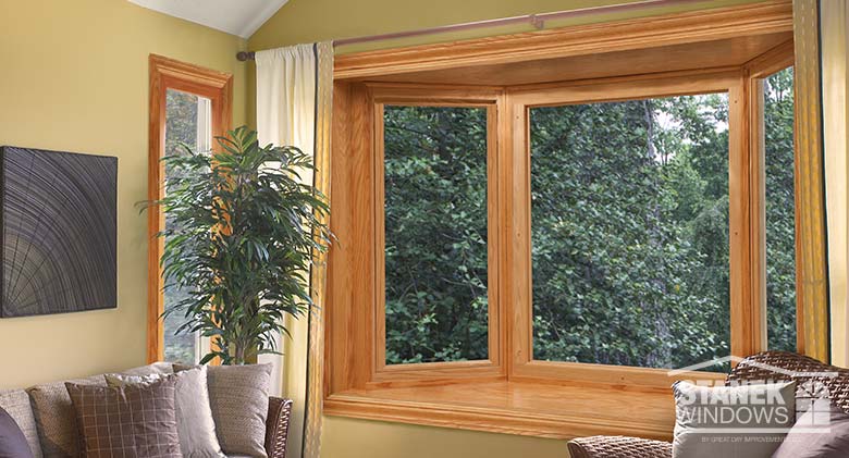 Three-lite bay window with interior woodgrain finish.