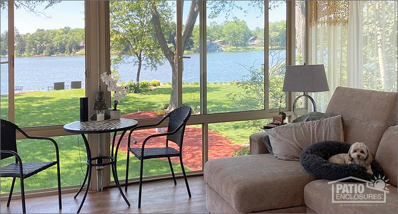 Family dog relaxing in a Patio Enclosures sunroom