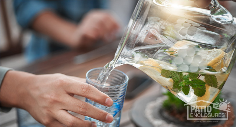 Pitcher of refreshing water with lemon and mint