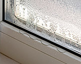 Window condensation with water leaking inside a home