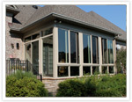 ranch home with sunroom