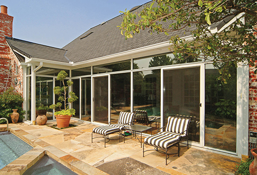 Inside View of a Sunroom Under Existing Roof As Part of a Patio