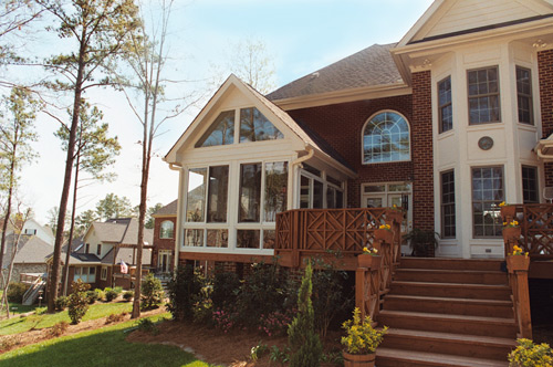 Outside View Of A Sunroom With Vaulted Ceiling As Part Of A Deck