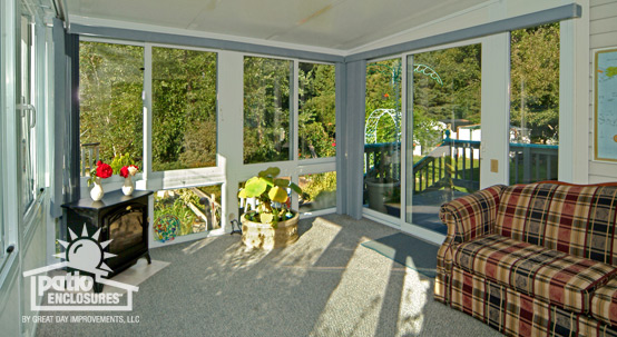 A pretty stovepipe fireplace in a small sunroom