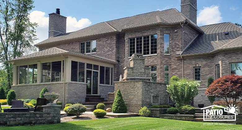 Stunning brick home with Patio Enclosures sunroom