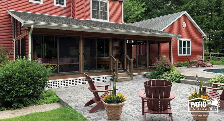 Enclosed deck leading out to outdoor seating area