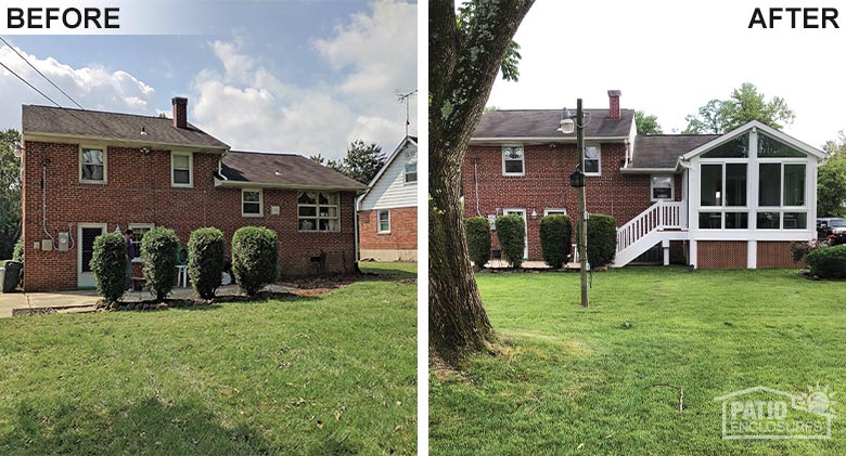 A vinyl four-season room with a gable roof is a perfect addition to this backyard.