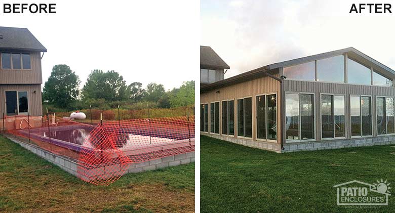 A traditional sunroom enclosed this outdoor pool for year-round use and expansive views of the lake.