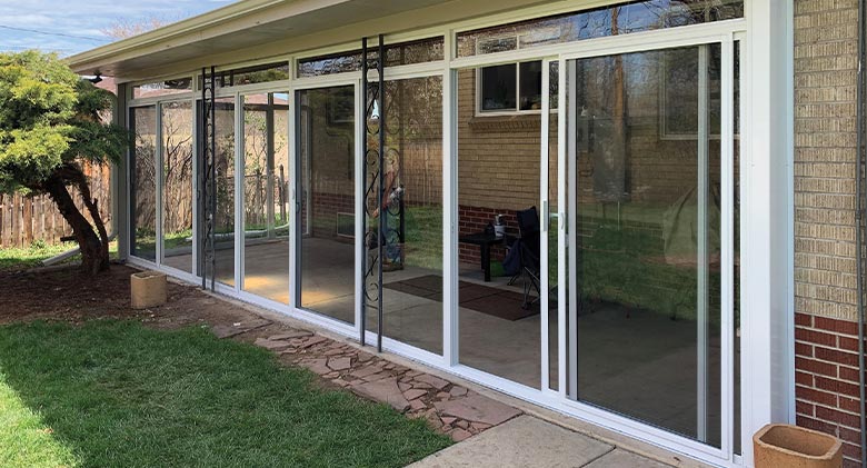 Three season room with insulated glass